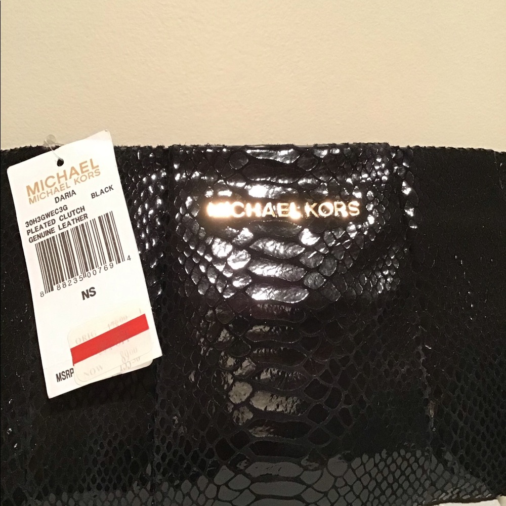 Michael Kors Leather clutch/shoulder purse